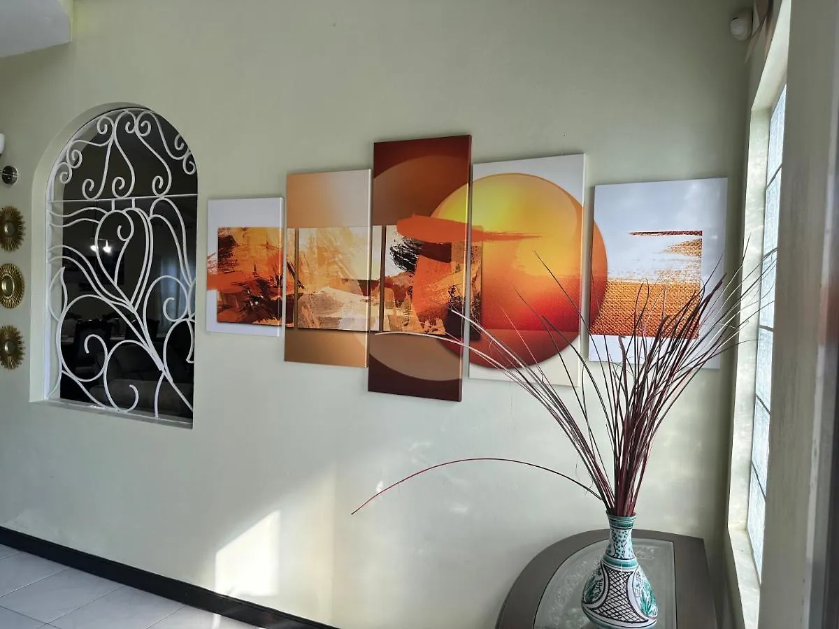 A Luxurious 4-Bedroom Private Villa With Games Room, Theatre & Modern Art Montego Bay