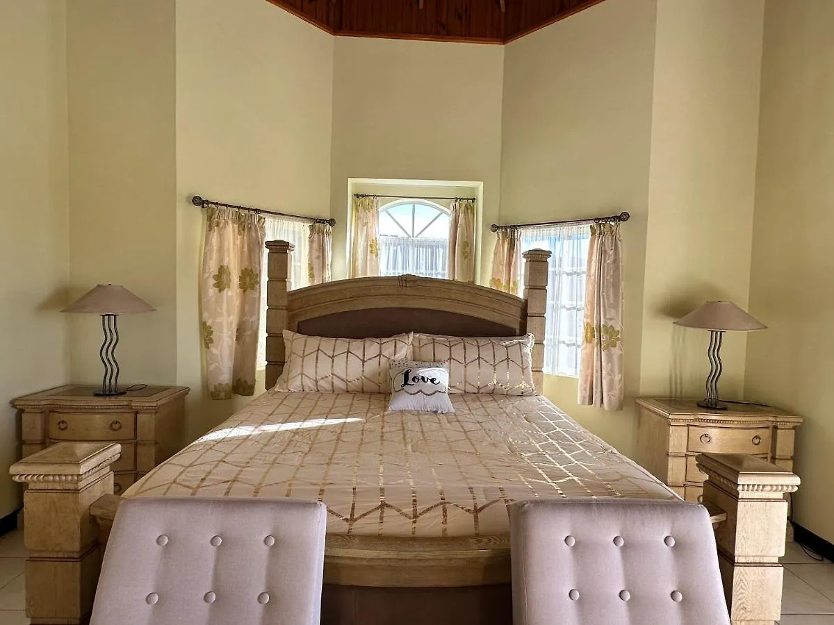 A Luxurious 4-Bedroom Private Villa With Games Room, Theatre & Modern Art Montego Bay Jamaica