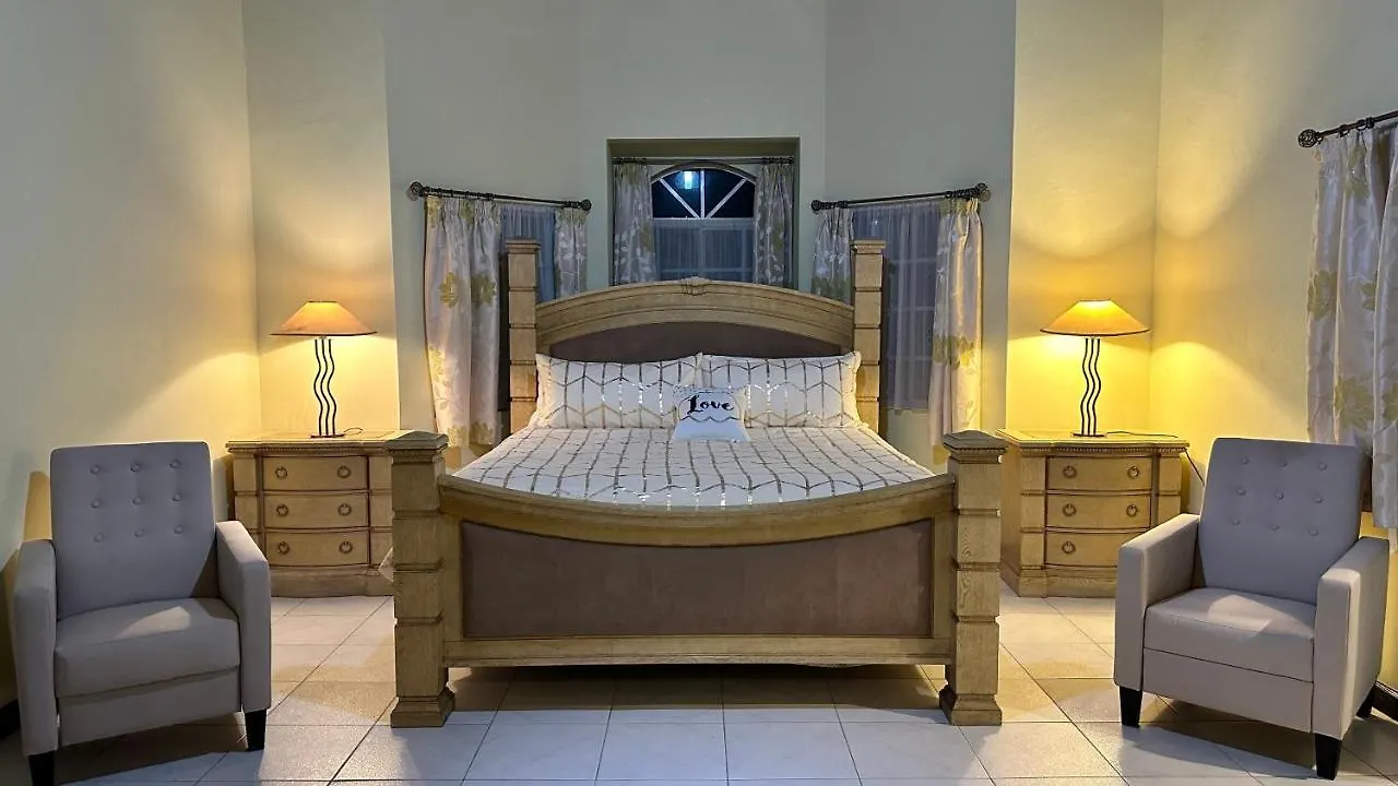 A Luxurious 4-Bedroom Private Villa With Games Room, Theatre & Modern Art Montego Bay