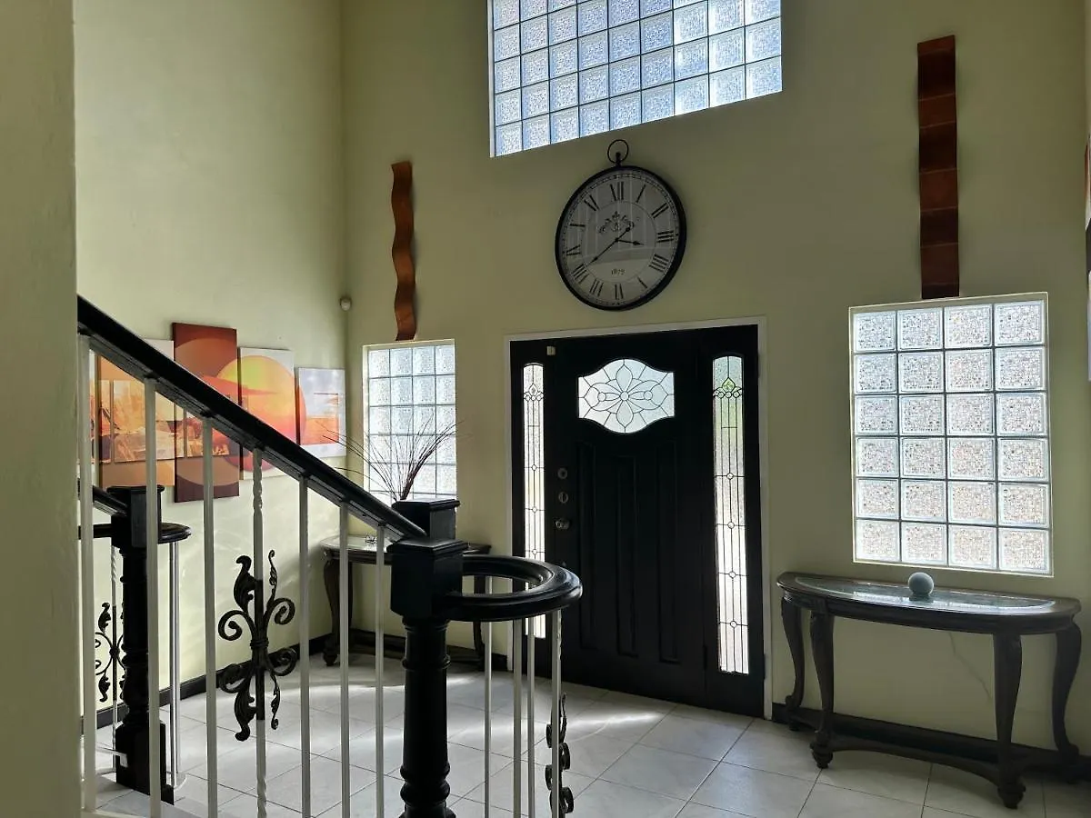 A Luxurious 4-Bedroom Private Villa With Games Room, Theatre & Modern Art Montego Bay