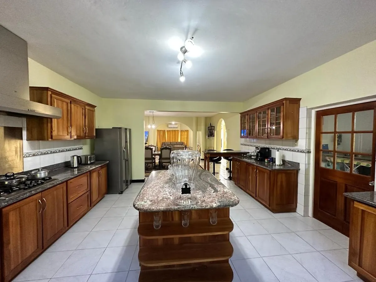 A Luxurious 4-Bedroom Private Villa With Games Room, Theatre & Modern Art Montego Bay