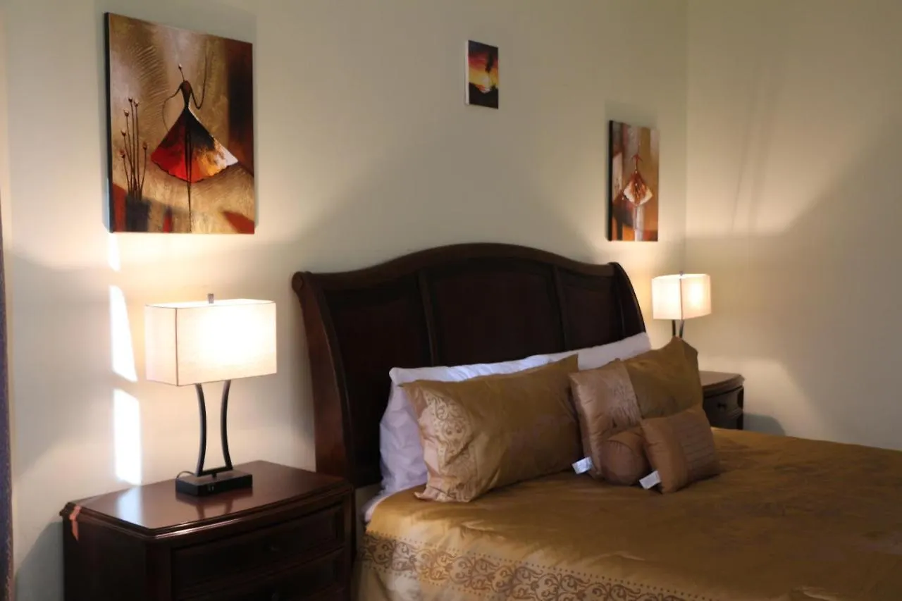 A Luxurious 4-Bedroom Private Villa With Games Room, Theatre & Modern Art Montego Bay
