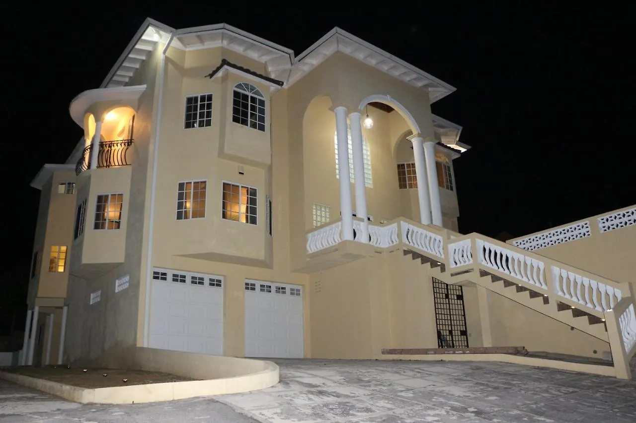 A Luxurious 4-Bedroom Private Villa With Games Room, Theatre & Modern Art Montego Bay
