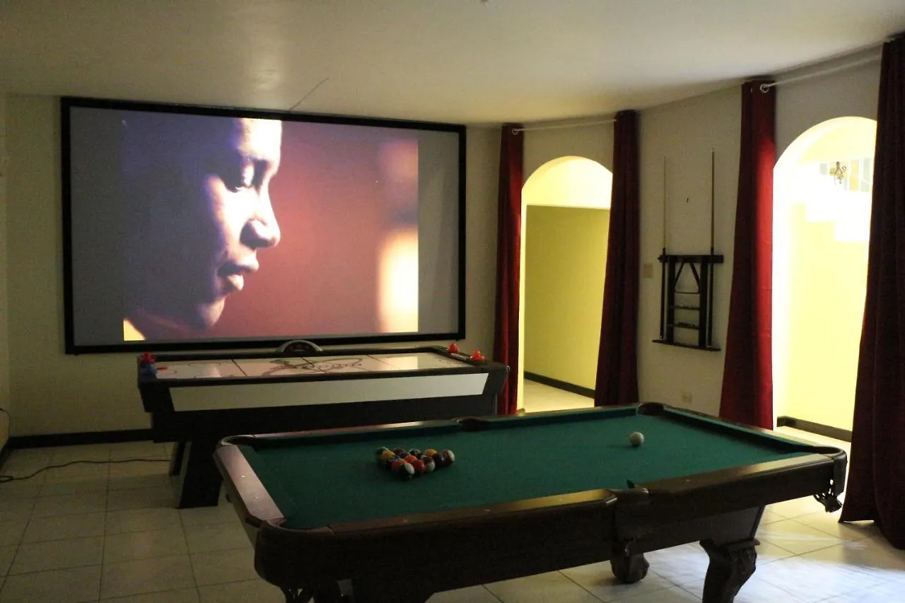 A Luxurious 4-Bedroom Private Villa With Games Room, Theatre & Modern Art Montego Bay Jamaica