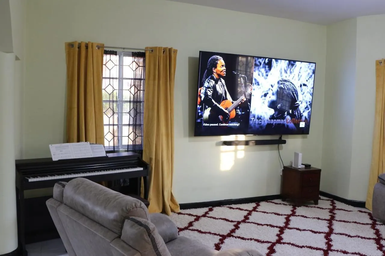 A Luxurious 4-Bedroom Private Villa With Games Room, Theatre & Modern Art Montego Bay