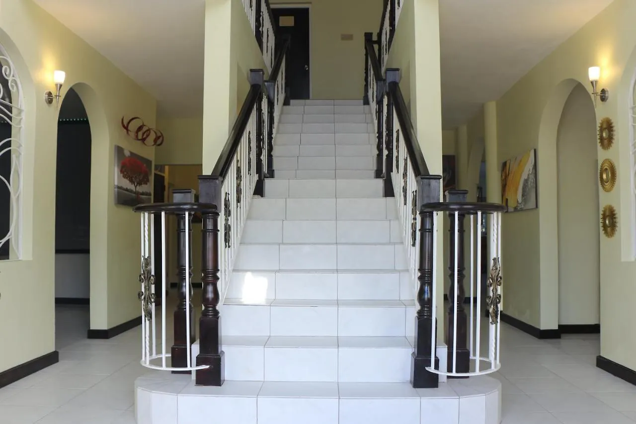 A Luxurious 4-Bedroom Private Villa With Games Room, Theatre & Modern Art Montego Bay