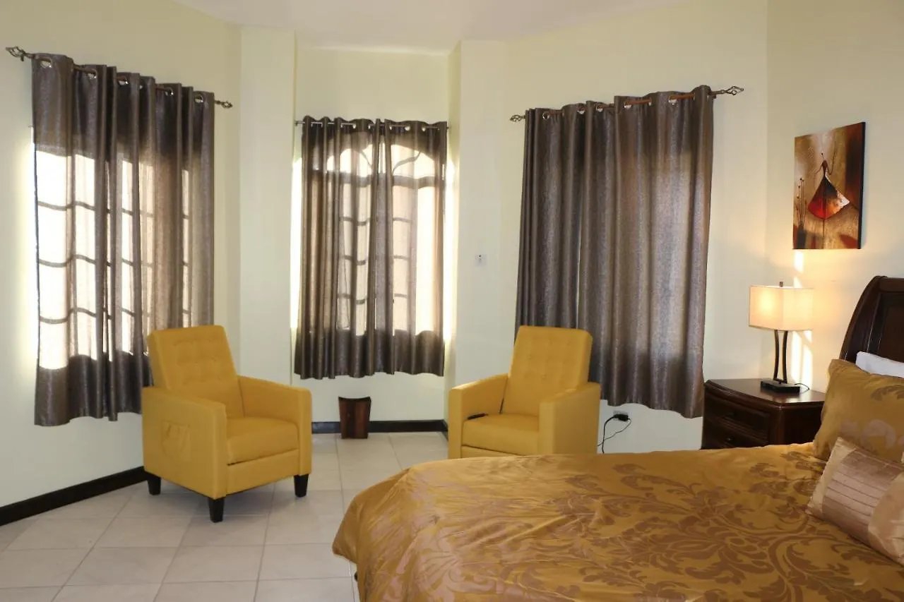 A Luxurious 4-Bedroom Private Villa With Games Room, Theatre & Modern Art Montego Bay Jamaica