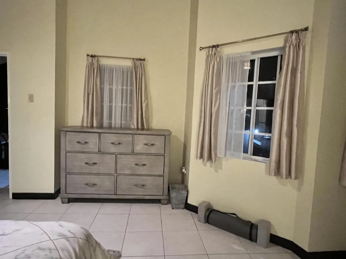 A Luxurious 4-Bedroom Private Villa With Games Room, Theatre & Modern Art Montego Bay