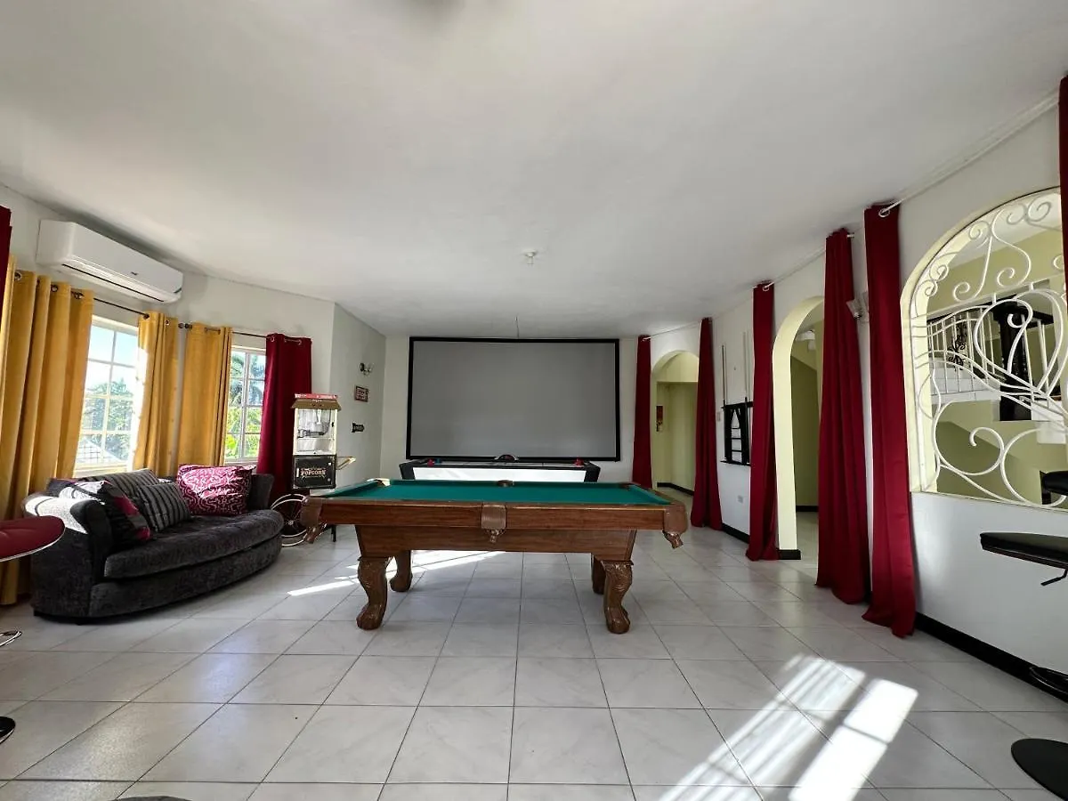 A Luxurious 4-Bedroom Private Villa With Games Room, Theatre & Modern Art Montego Bay